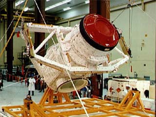 External airlock assembly/Mir docking system being loaded